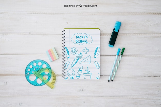 Back to school mockup with notepad and set square