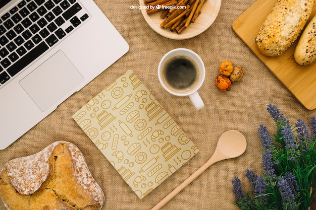Book cover composition with breakfast and laptop
