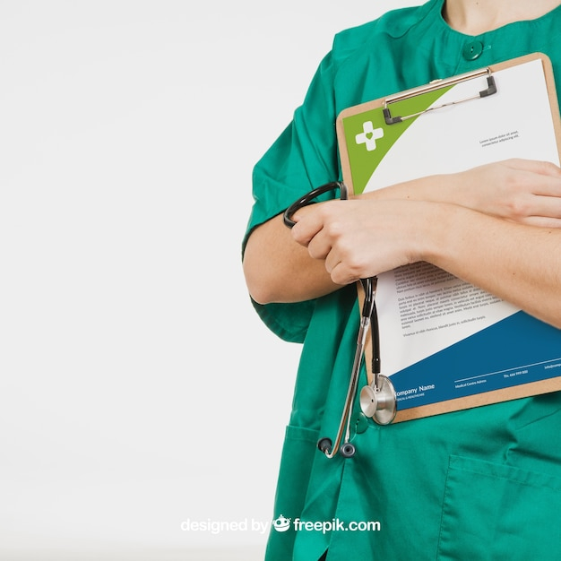 Nurse holding board with document
