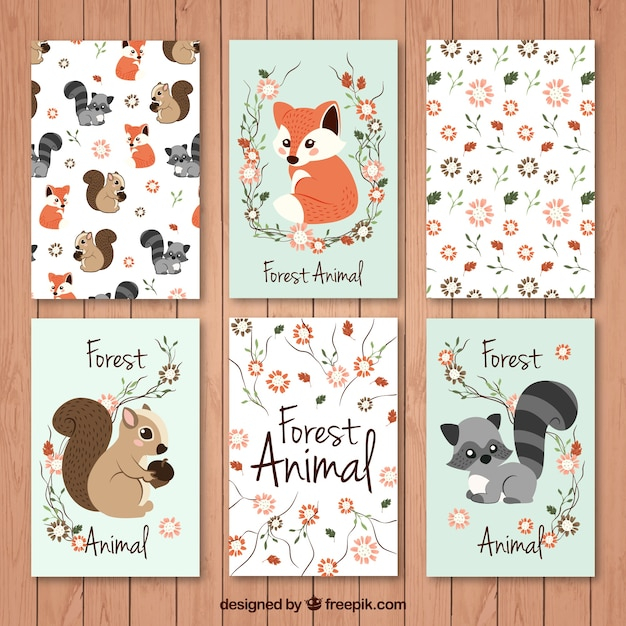 Cards set beautiful forest animals with floral details