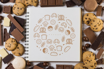 Square booklet mockup on chocolate background Free Psd