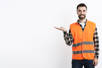 Man in safety vest posing Free Photo