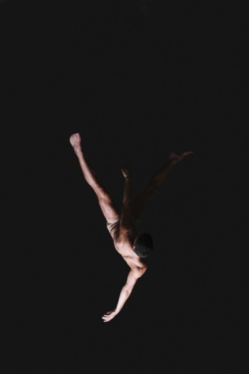 Male gymnast performing in air Free Photo