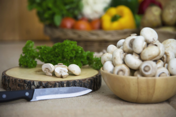 Fresh champignon mushroom vegetable in the kitchen Free Photo