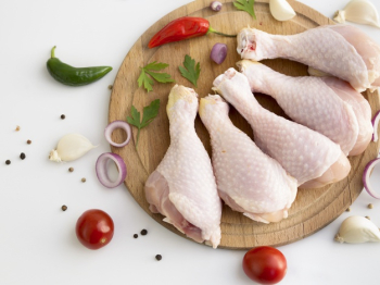 Raw chicken parts with different ingredients Free Photo