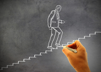  Businessman climbing staircase - Concept of climbing the career 