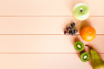 Healthy food composition with fruits and copyspace