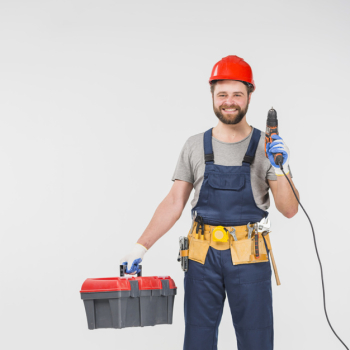 Repairman with tool box holding drill