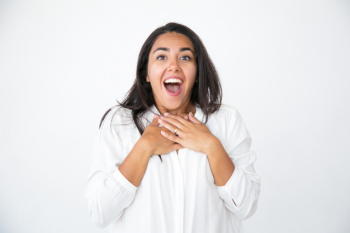 Happy shocked woman gasping of surprise Free Photo