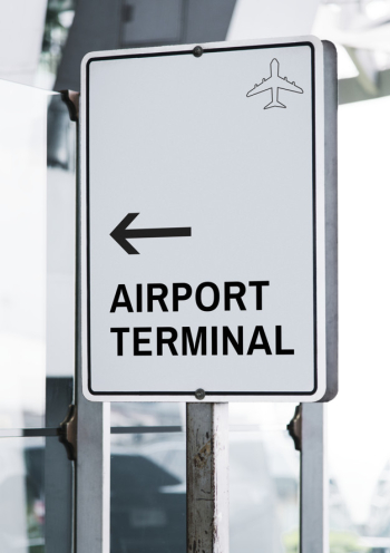 White traffic signboard mockup at an airport Free Psd