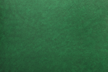 An old green paper textured background