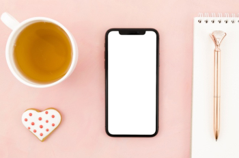 Top view smartphone template over workspace Free Photo