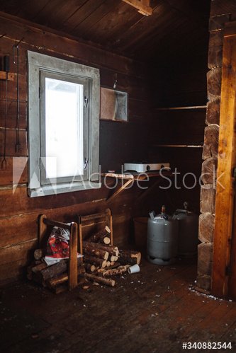 Stove and firewood in a hut