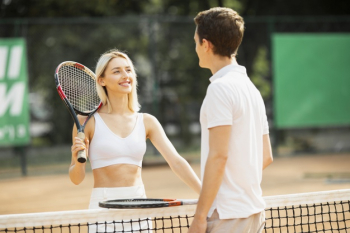 Active couple on the tennis court Free Photo