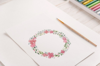 Design of flowers frame painted with watercolors on paper Free Photo
