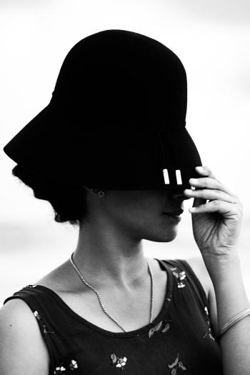 Gray-scale Photo of Woman In Black Bucket Hat