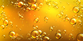 Vector realistic yellow oil with air bubbles Free Vector