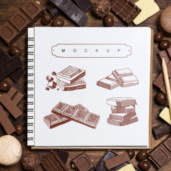 Square booklet mockup on chocolate background Free Psd