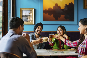 People celebrating Holi day in restaurant | Free Photo - rawpixel