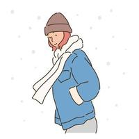 A woman in a winter hat and scarf is hitting the snow. hand drawn style vector design illustrations. Free Vector