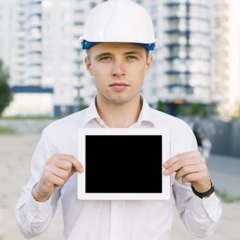 Front view man holding up tablet Free Photo