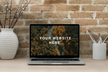 Realistic MacBook Workspace Mockup your website here 