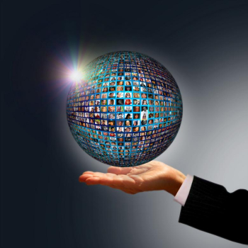 Businessman holding a globe made of people