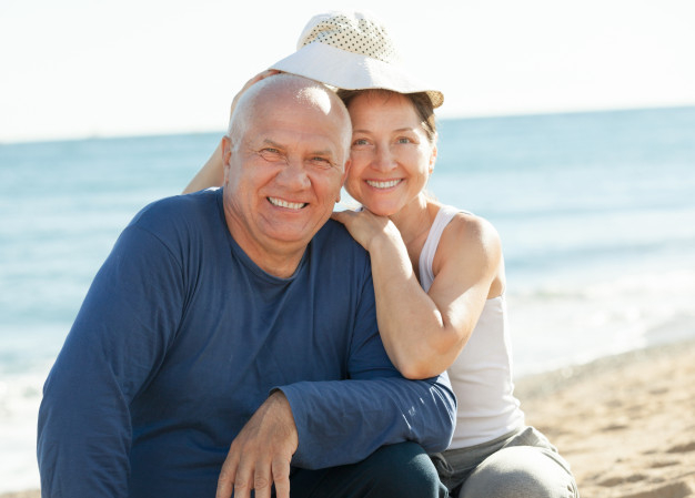 Older Couple On Beach