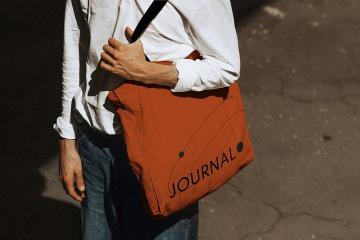 mockup,person,tote bag mockup,orange,fashion,red,journal,photo,man,text space,tote bag,graphic,rawpixel
