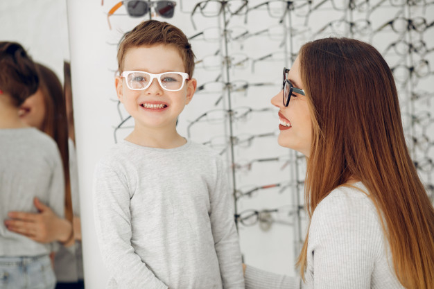 eyesight,ophthalmologist,wearing,optometrist,correction,choosing,optician,spectacle,little,cheerful,optic,son,buying,wear,smiling,testing,rack,optical,eyeglasses,retail,beautiful,buy,young,lens,shelf,care,customer,modern,new,store,boy,medicine,person,makeup,glasses,child,mother,kid,shop,happy,eye,smile,health,shopping,hair,woman,family,people,frame