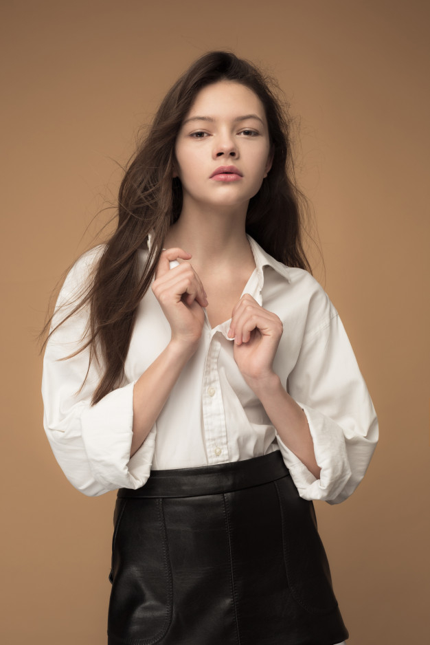 posing,vogue,cheerful,casual,teenage,looking,pretty,adult,gesture,joy,teen,portrait,sitting,expression,beautiful,young,youth,model,teenager,natural,person,human,cute,fashion,people